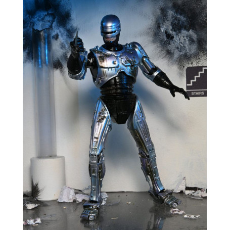 Neca - RoboCop - Ultimate Battle Beschädigter RoboCop mit Stuhl